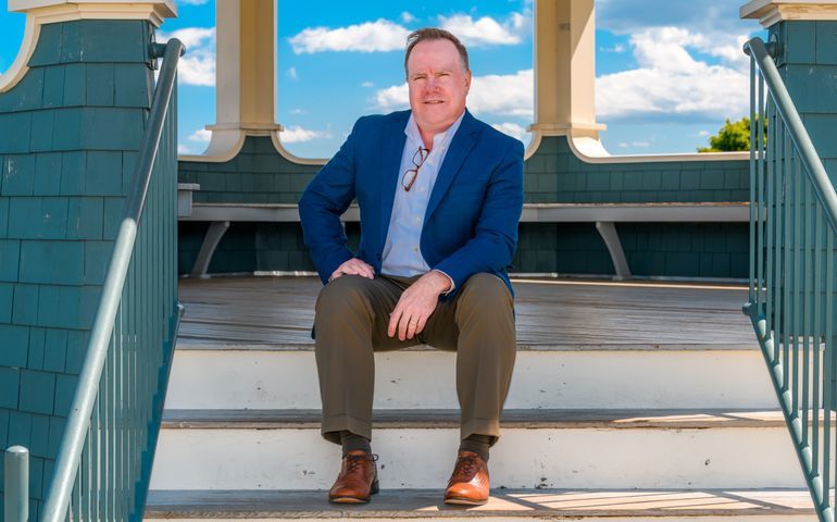 person sitting on steps