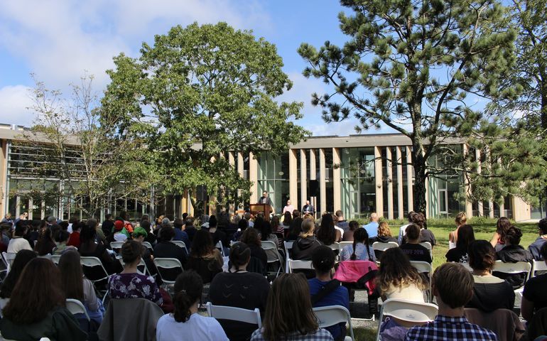 building and people in outdoor seats