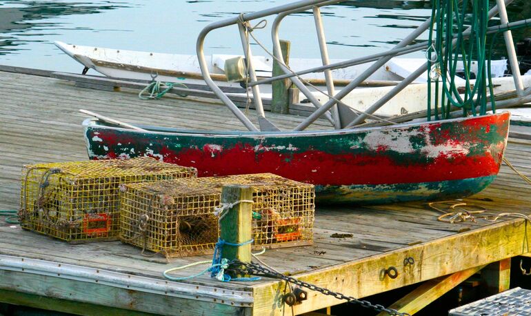 2 traps and dinghy on pier