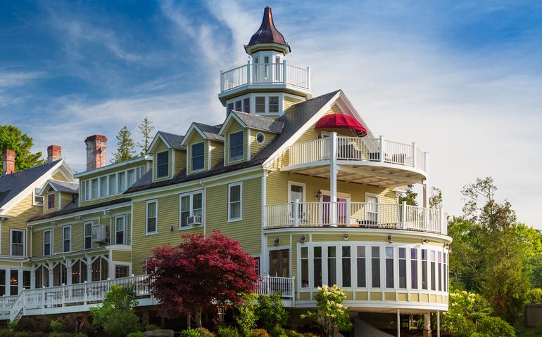 yellow building with white trim