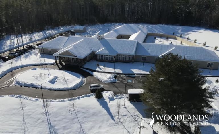 Aerial view senior living facility in winter 