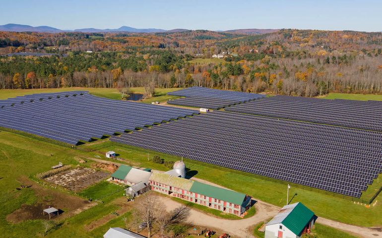 solar panels and forest and hills