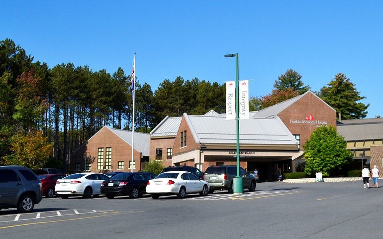 hospital building and parking lot