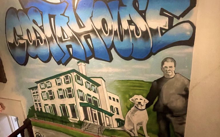 mural of building person dog
