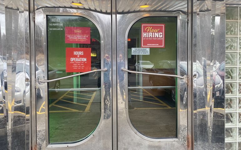 We are hiring sign on a door. 