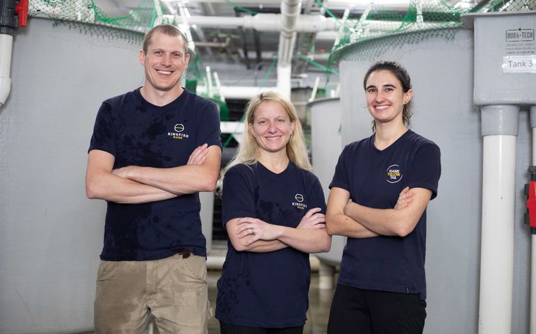 3 people smiling with arms crossed