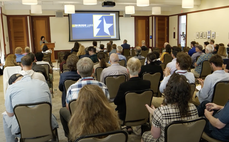 People listening to speaker at last year's pitch contest