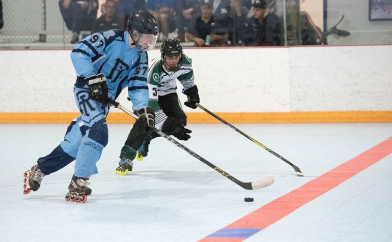 Roller hockey players in action