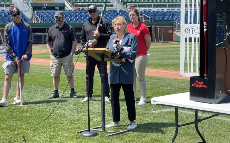 group photo at Hadlock Field with baseball scanner