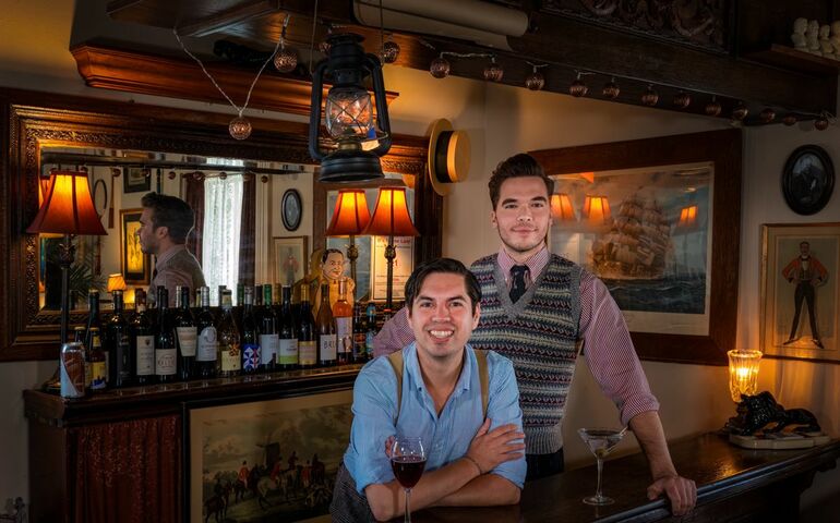 2 people at bar