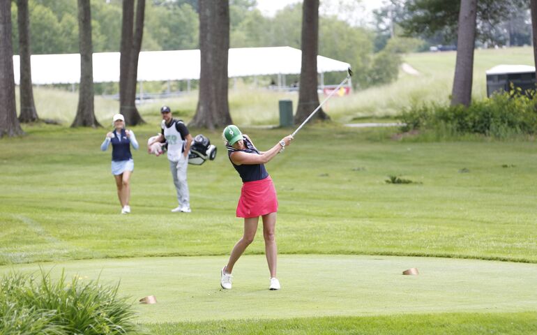 Woman golfing 