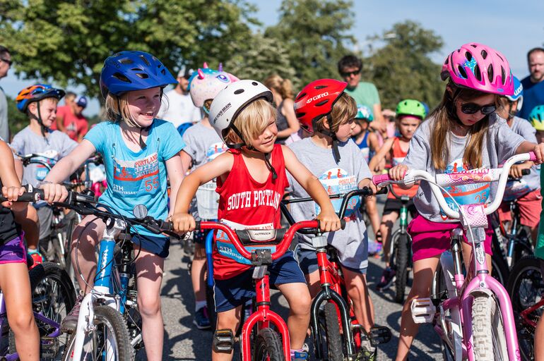 kids in helmet on bikes