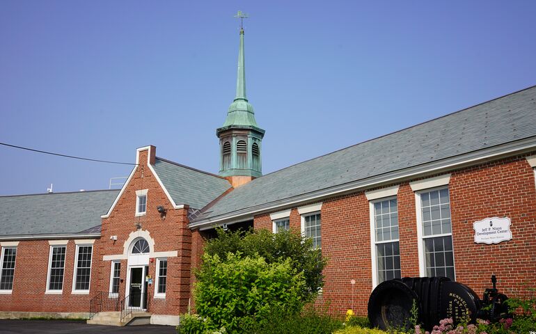 brick building with copper structure