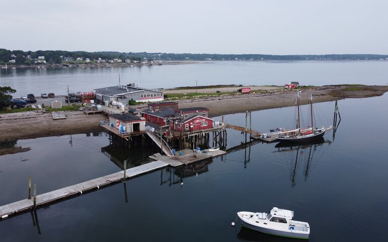 aerial of buildings piers water boats