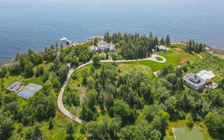 aerial of structures road land woods