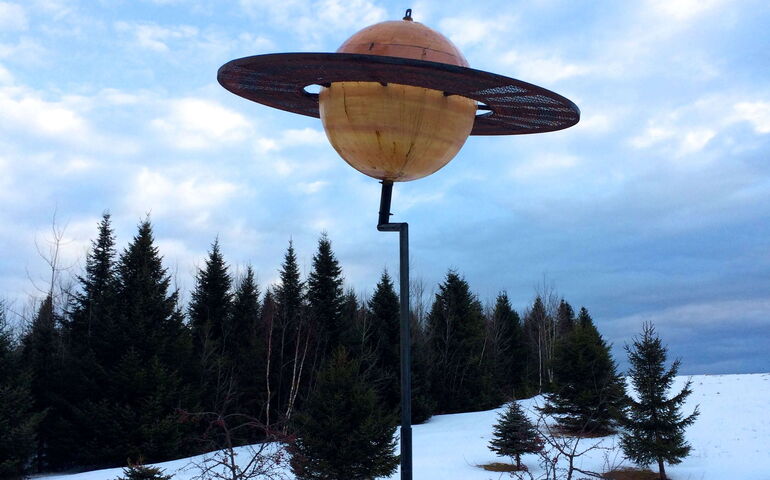 model of saturn on a stand