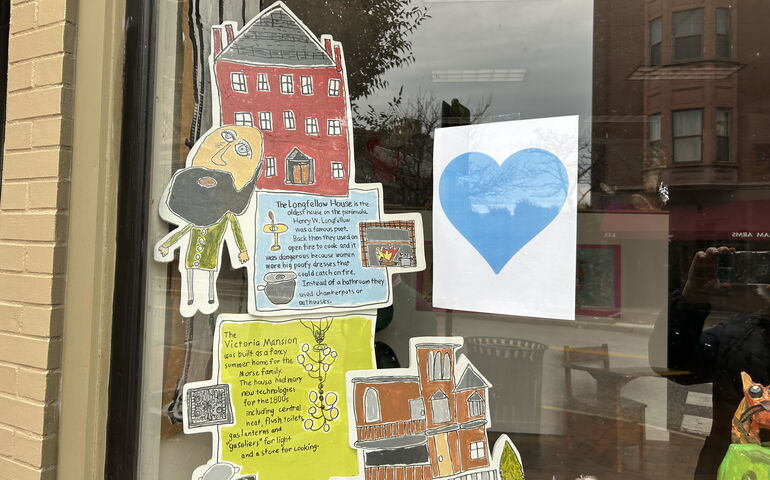 Storefront window with a blue heart 