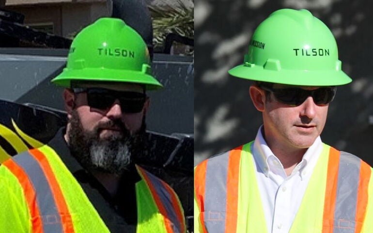 Two guys in hard hats 