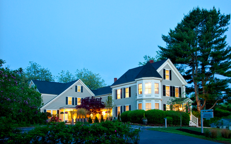 house at night with lights on