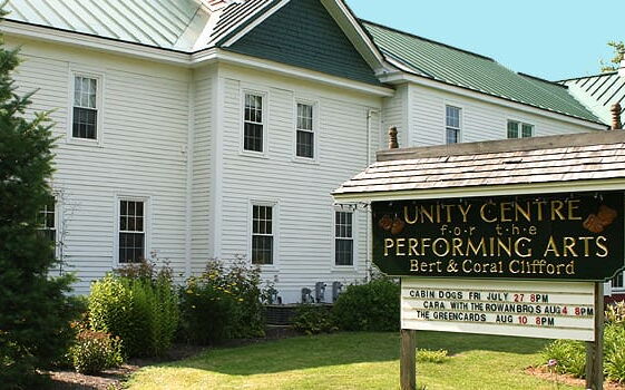 white-sided building with sign