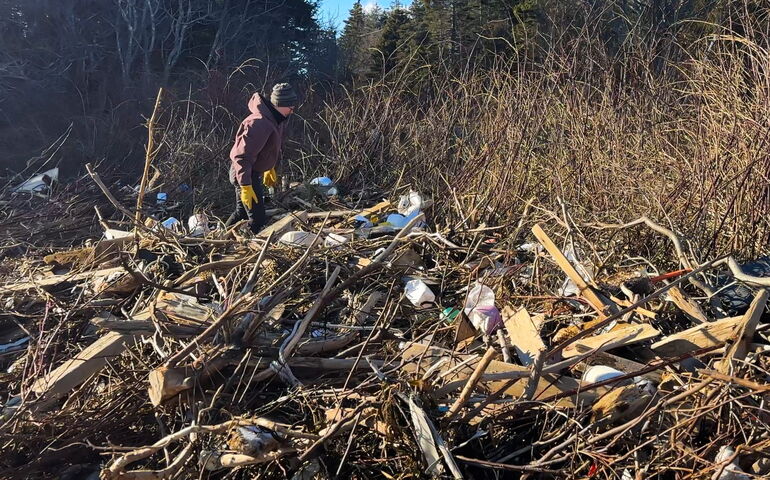 debris and person walking behind