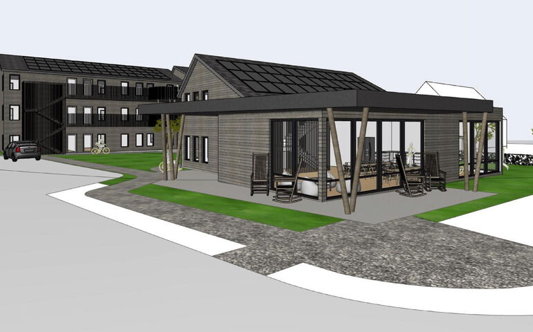 A rendering shows an apartment building.