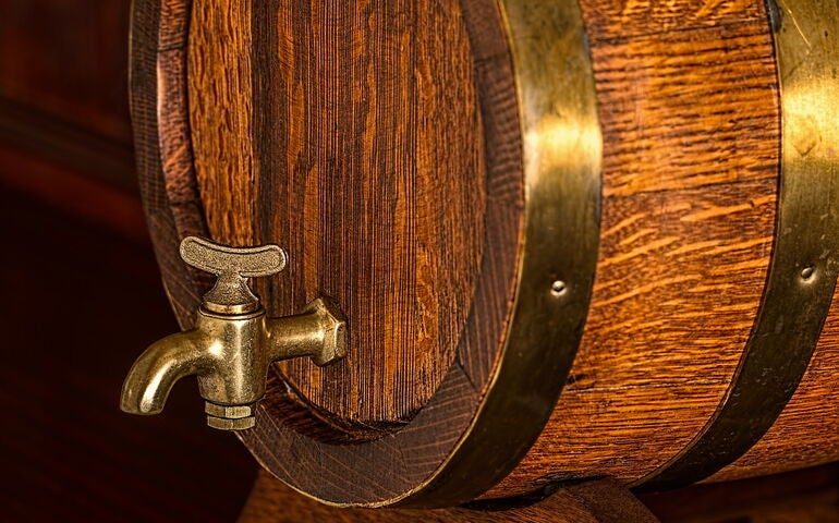 Beer barrel with golden tap 