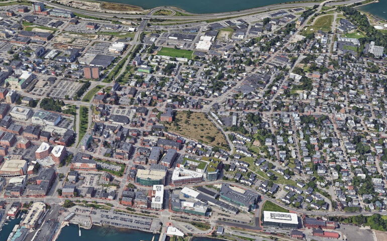 An aerial shows part of a city.