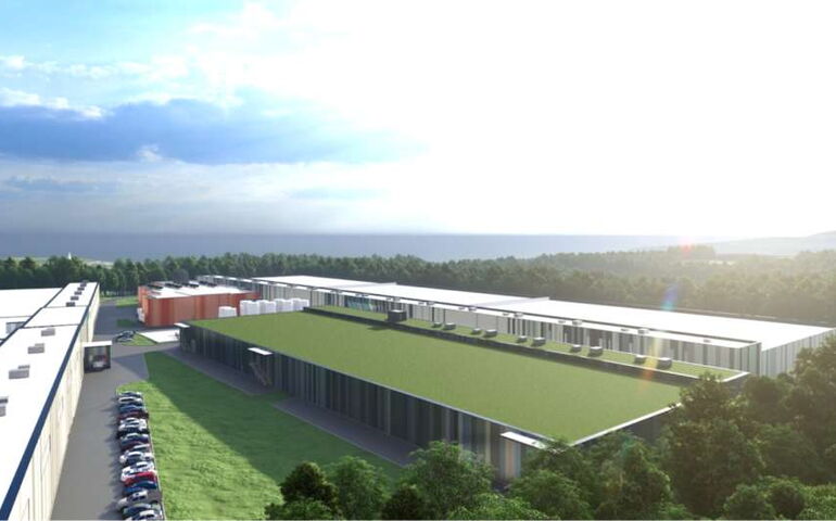 A rendering shows long, low buidlings.