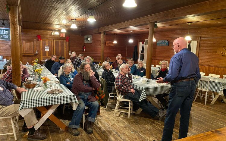 People at a community supper hosted by Community Plate 