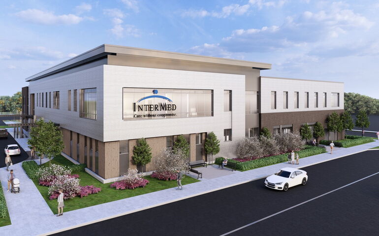 A rendering shows the exterior of a two-story building.