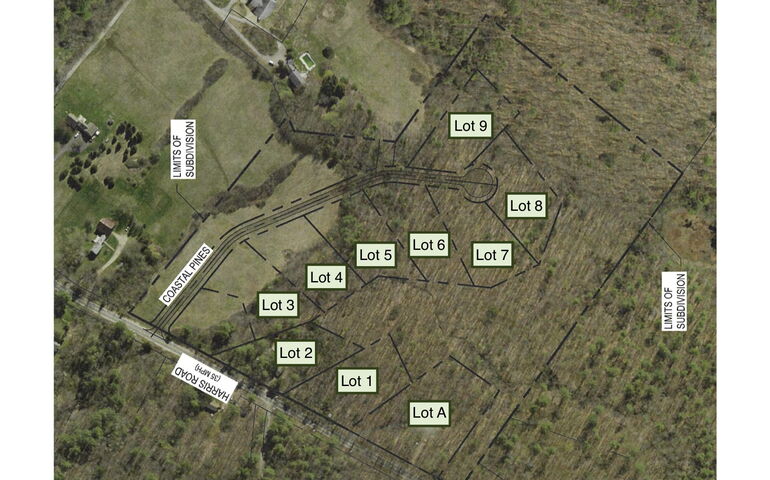An aerial view of woods and fields with lines and words overlaid.