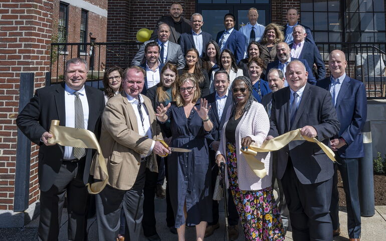 people at a ribbon cutting