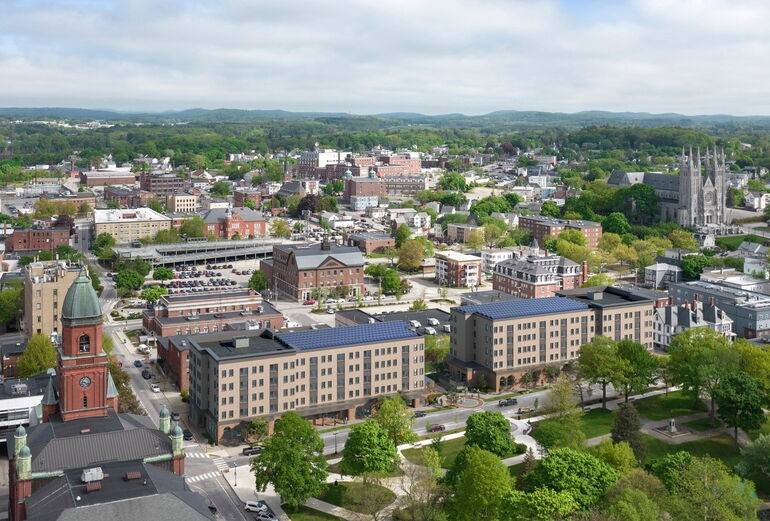 two apartment buildings from an aerial view