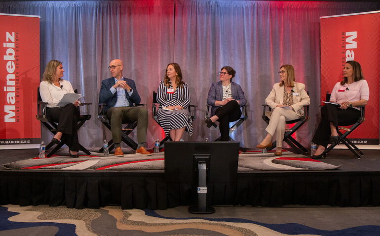 Mainebiz Health Care Forum panelists on stage 