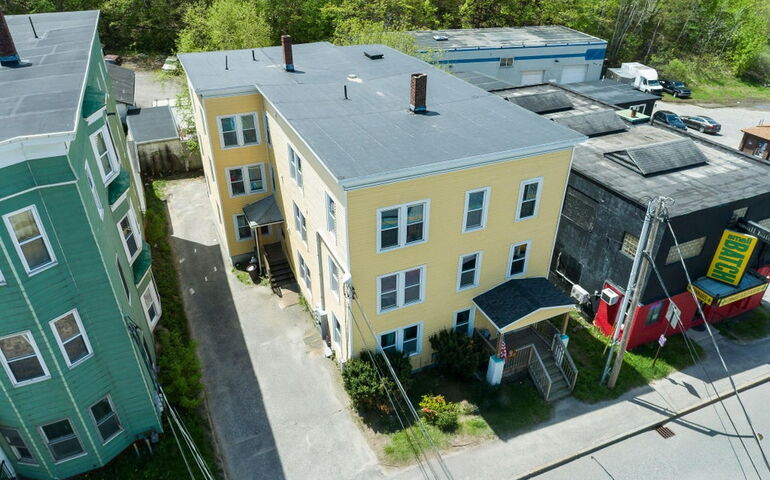 yellow apartment building, aerial view
