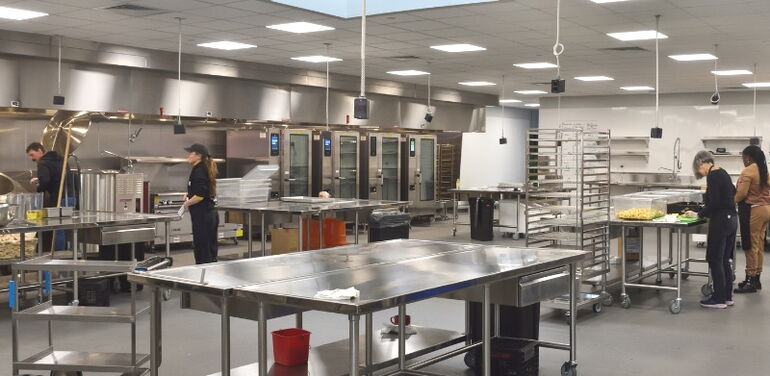 workers in a commerial kitchen