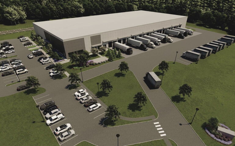 An illlustration shows a building and parking lot.