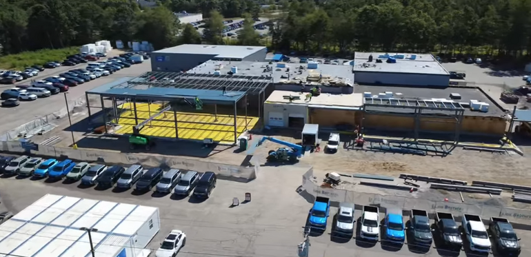aerial view of auto dealership expansion project