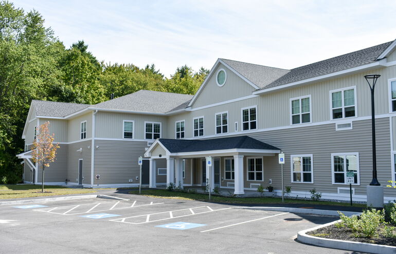 photo of the front of a new apartment complex