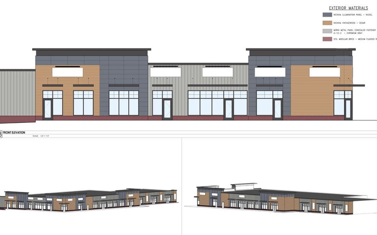 A rendering shows low-lying buildings.