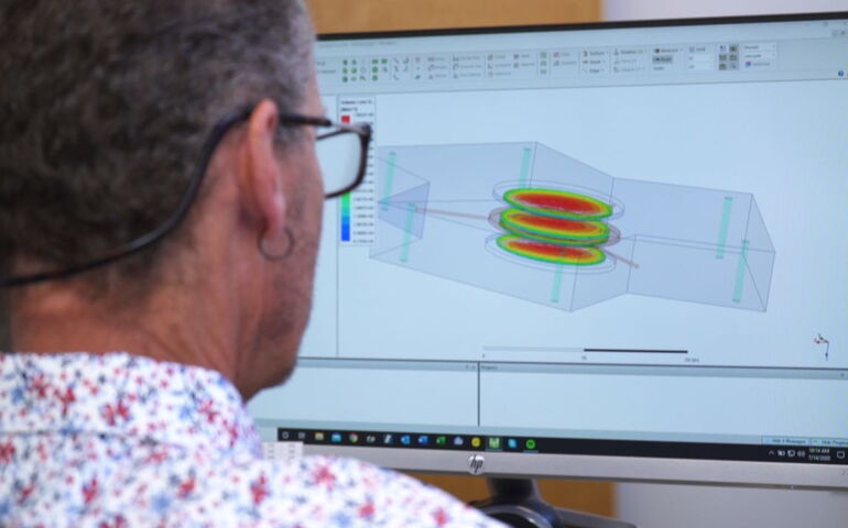 A person looks at a computer screen.