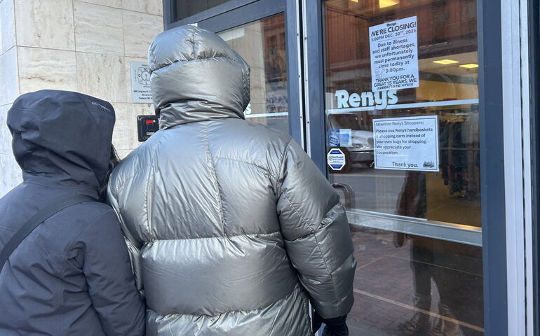 Renys customers outside locked door on store's last day.