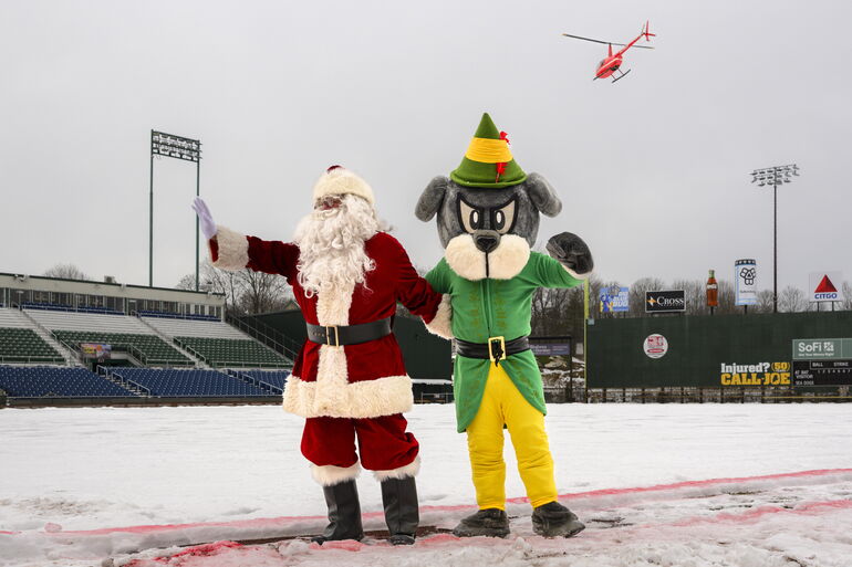 Sluggrer and Santa at snowy Hadlock Field 