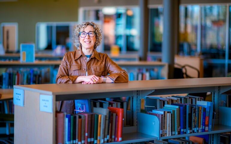 Jeannine Diddle Uzzi in the Thomas College library. 