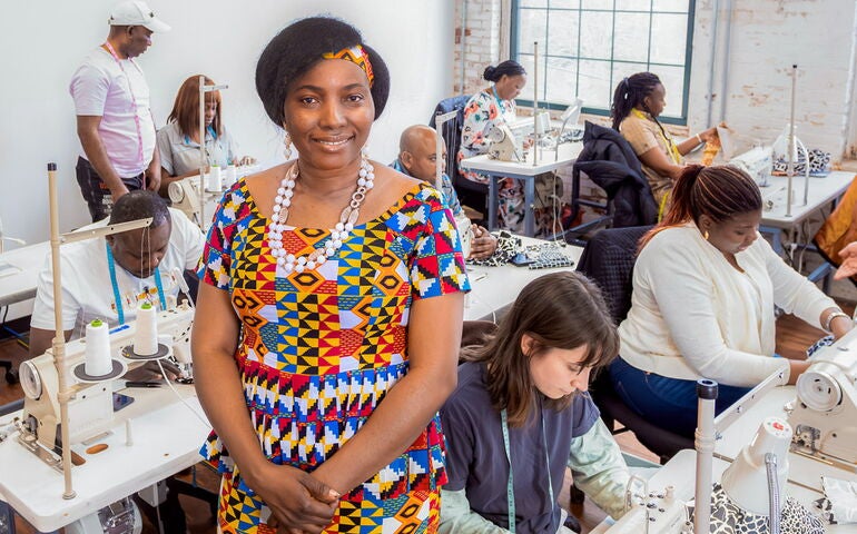 People in sewing school classroom