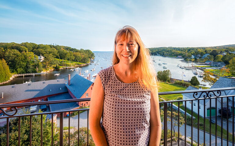 woman standing on balcony