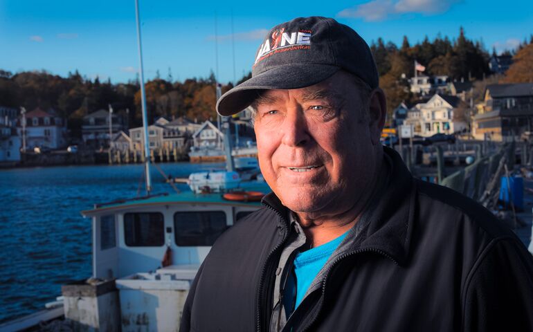 portrait of lobsterman in baseball cap