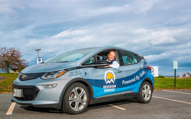 Barry Woods in a ReVision Energy electric car 