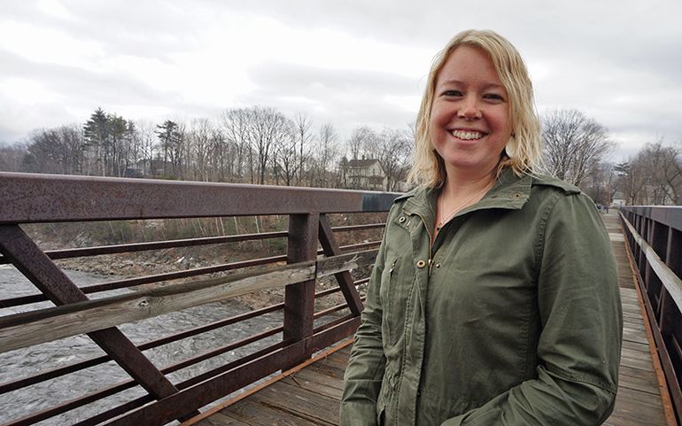 Woman standing on bridge